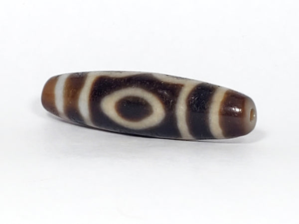 The Three-Eye Dzi Bead: Symbolism and Significance - Ancient Dzi Shop