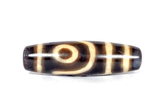 The Two-Eye Dzi Bead: Symbolism and Significance - Ancient Dzi Shop