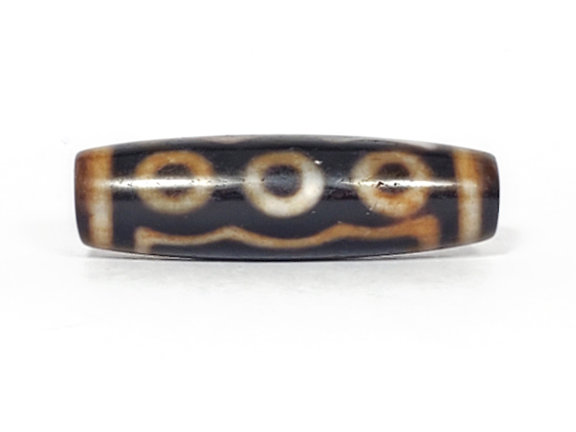 real Tibetan Five Eye Motif dzi bead with bloodspot inclusions.