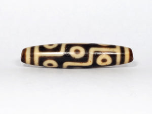 real Tibetan nine eye dzi bead.  beautiful colors mark this piece.