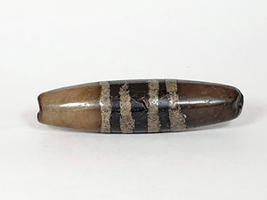 Ancient Seven Stripe Chung Dzi (ACD-SeS-2)- Extremely Old. A rare and remarkable ancient Tibetan bead with seven distinct stripes, representing spiritual significance and cultural heritage