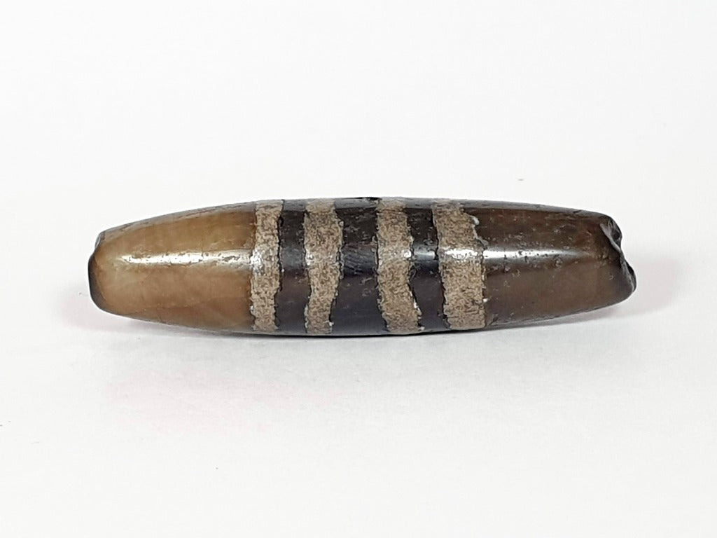 Ancient Seven Stripe Chung Dzi (ACD-SeS-2)- Extremely Old. A rare and remarkable ancient Tibetan bead with seven distinct stripes, representing spiritual significance and cultural heritage