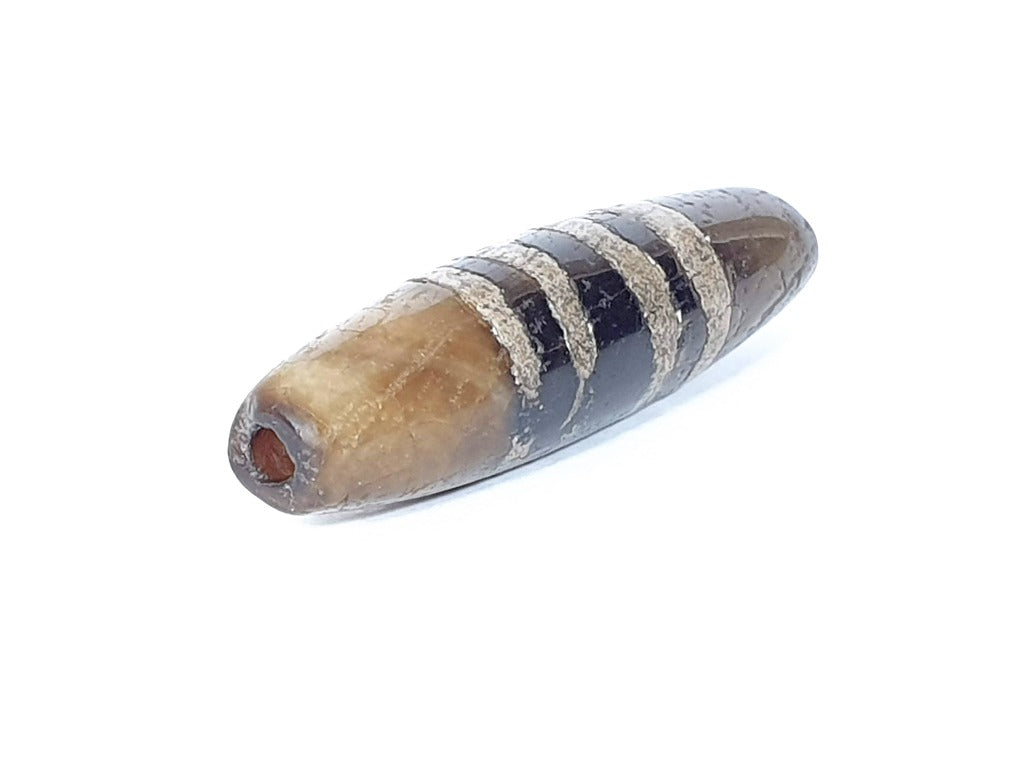 Ancient Seven Stripe Chung Dzi (ACD-SeS-2)- Extremely Old. A rare and remarkable ancient Tibetan bead with seven distinct stripes, representing spiritual significance and cultural heritage