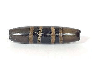 Rare Ancient Seven Stripe Chung Dzi" Description: "Authentic and rare ancient Seven Stripe Chung Dzi bead, a treasured artifact from the past. This bead holds immense historical significance and is extremely old."