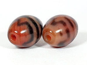 Pair of Antique Round Tiger Tooth Motif Dzi Beads With Bloodspots