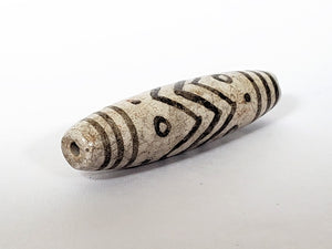 Vintage White Tiger Stripes, Eyes & Stars Dzi Bead" Description: "A vintage Dzi bead with a faux antique appearance featuring captivating white tiger stripes, mesmerizing eyes, and celestial stars motif