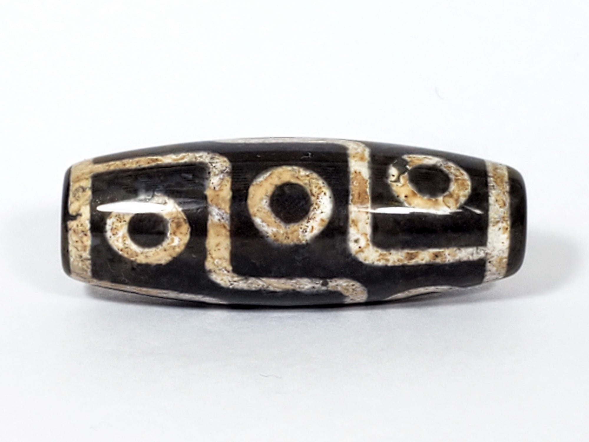 black colored nine eye dzi bead with mercuric oxide inclusions - new nine eye dzi - The Ancient Dzi Shop is the most reliable dzi shop on the internet.