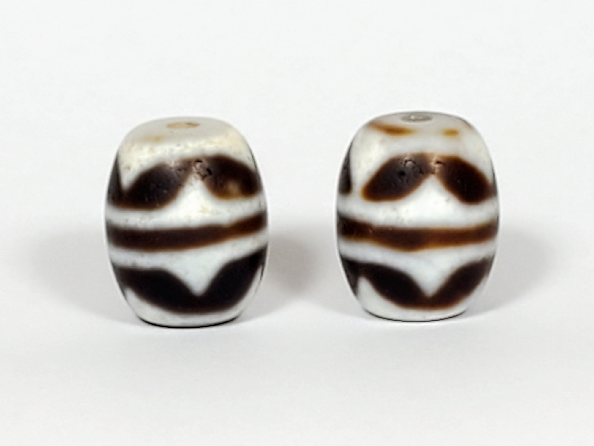 Pair of Vintage Double Tiger Tooth Motif Dzi Beads (TT-041122)