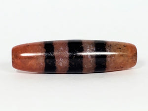 Five Stripe Chung Dzi - 措思天珠" Description: "Authentic Five Stripe Chung Dzi bead known as 措思天珠. This ancient bead showcases its unique five stripe pattern and carries cultural significance