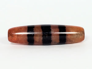 Five Stripe Chung Dzi - 措思天珠" Description: "Authentic Five Stripe Chung Dzi bead known as 措思天珠. This ancient bead showcases its unique five stripe pattern and carries cultural significance