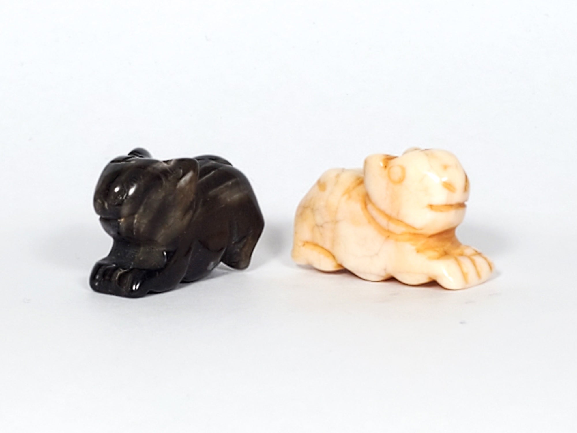 Pair of Antique Tibetan Carved Marmot Beads