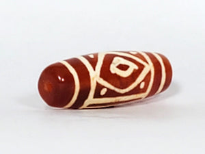 Collectible Diamond Eye-In-Eye & Star Motif Carnelian Dzi Bead" Description: "Collectible Dzi bead carved from carnelian, adorned with an enchanting Diamond Eye-In-Eye & Star motif. This bead holds immense collectible value and artistic charm."