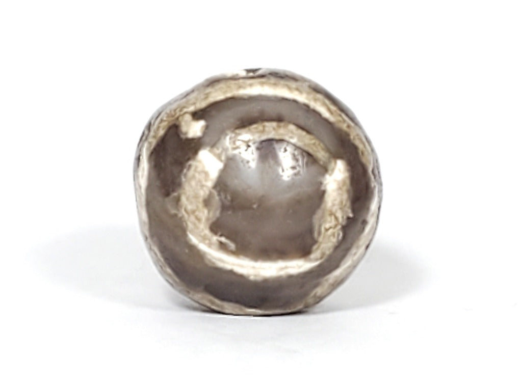 Ancient Dzi Bead - Five Stripe Motif. An authentic ancient Dzi bead featuring an intricate Five Stripe motif, representing a connection to ancient traditions and cultural heritage. This bead holds spiritual significance and is admired for its craftsmanship and historical value."