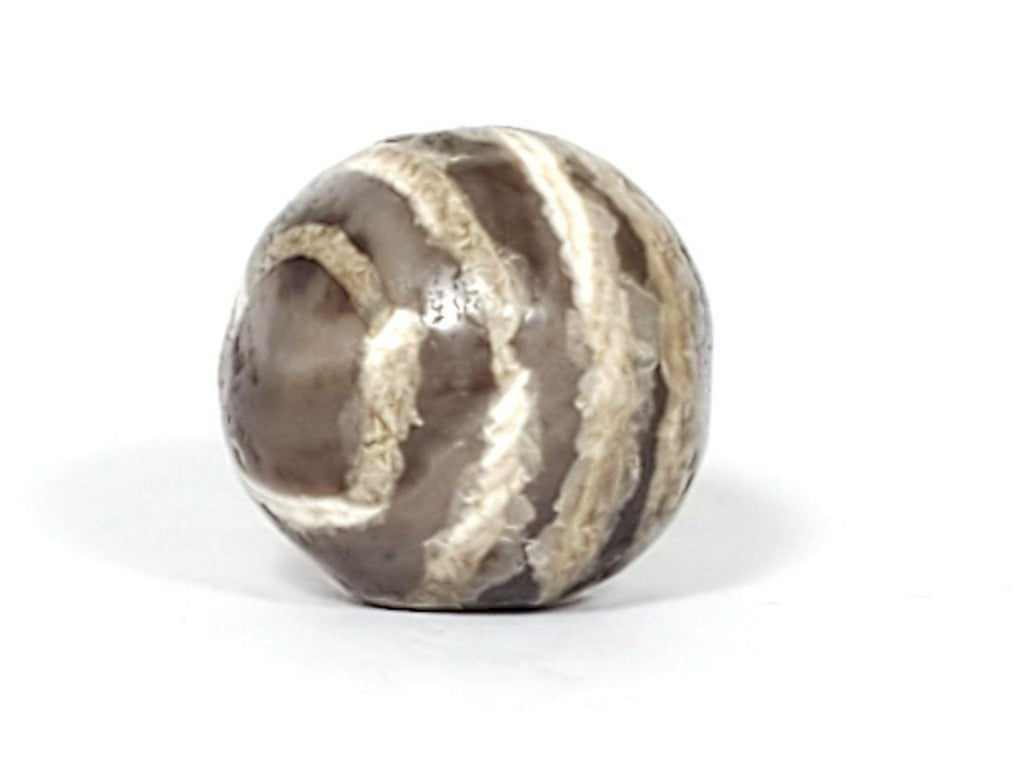 Ancient Dzi Bead - Five Stripe Motif. An authentic ancient Dzi bead featuring an intricate Five Stripe motif, representing a connection to ancient traditions and cultural heritage. This bead holds spiritual significance and is admired for its craftsmanship and historical value."