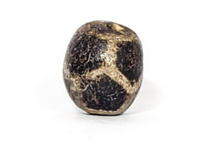 Ancient Longevity Motif Dzi (AZ015) - Extremely Old. A rare ancient Dzi bead featuring the coveted Longevity motif, cherished for its exceptional age and rarity. This weathered bead encapsulates the wisdom and blessings of ancient Tibetan traditions, symbolizing longevity, well-being, and good fortune. With its enduring beauty and symbolic significance, this Dzi bead is a sought-after collector's item and a symbol of spiritual connection to the past